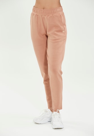 Effilé Pantalon de sport Athlecia en beige : devant