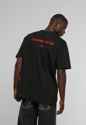 MT Upscale T-Shirt 'Upscale World Wide' in Schwarz