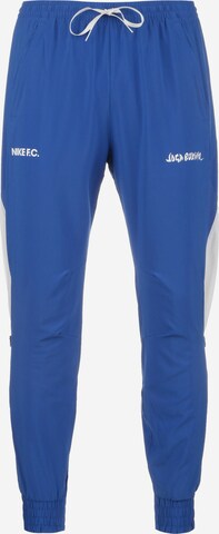 Effilé Pantalon de sport NIKE en bleu : devant