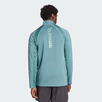 ADIDAS PERFORMANCE - Camiseta funcional en azul