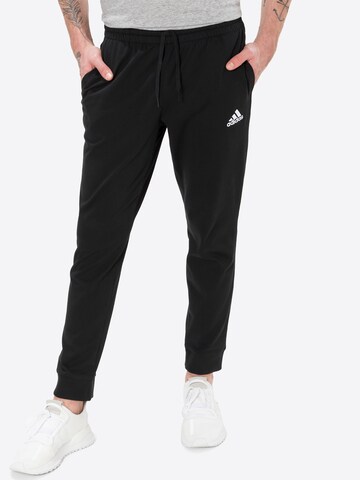 ADIDAS SPORTSWEAR Tapered Sports trousers 'Essentials Tapered Cuff' in Black: front