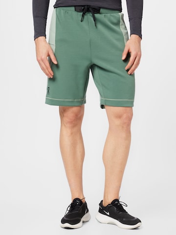 On Regular Pants in Green: front