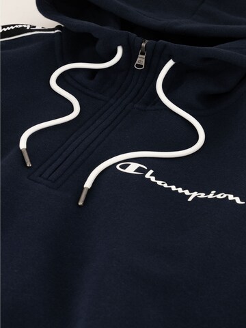 Champion Authentic Athletic Apparel Sweatshirt i blå