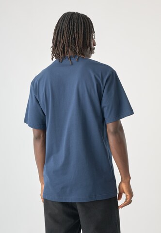 T-Shirt Cleptomanicx en bleu