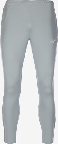 NIKE Slim fit Workout Pants in Grey: front