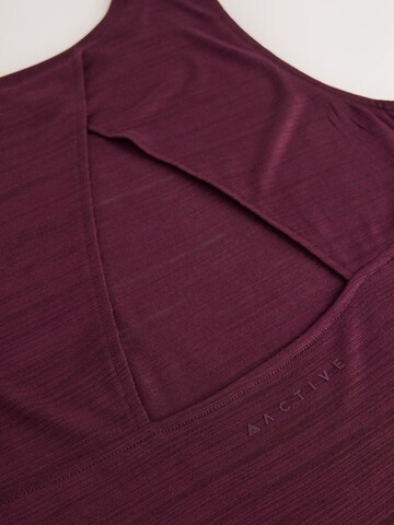 Top sportivo di Next in rosso