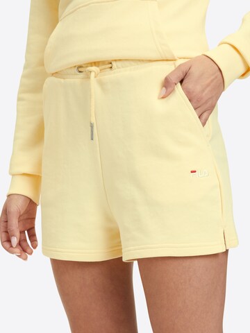 FILA Regular Sports trousers 'BUCHLOE' in Yellow