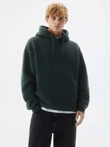 Bluză de molton de la Pull&Bear pe verde: față