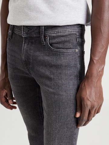 JACK & JONES Skinny Kavbojke 'Liam' | črna barva