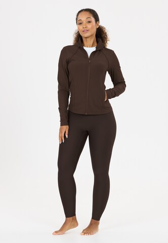 Athlecia Sportjacke 'Thrine' in Braun
