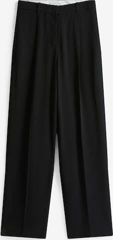 TOMMY HILFIGER Loose fit Pleat-front trousers in Black: front
