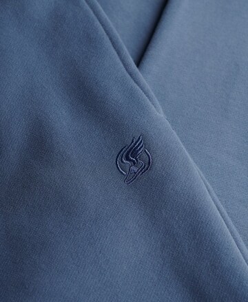 Superdry Tapered Broek in Blauw