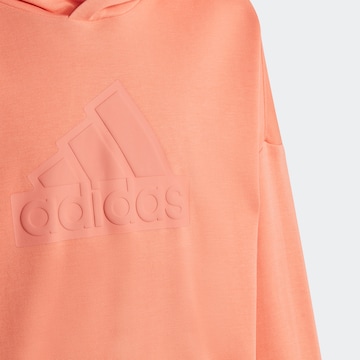 ADIDAS SPORTSWEAR Urheilullinen collegepaita 'Future Icons' värissä oranssi