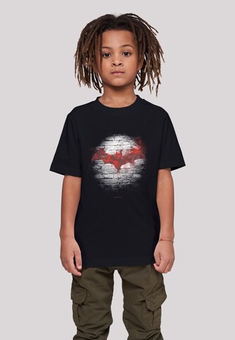 F4NT4STIC T-Shirt 'Batman Logo Wall' in Schwarz: predná strana