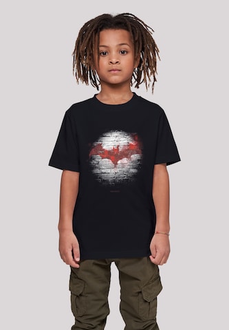 F4NT4STIC Shirt 'Batman Logo Wall' in Zwart: voorkant