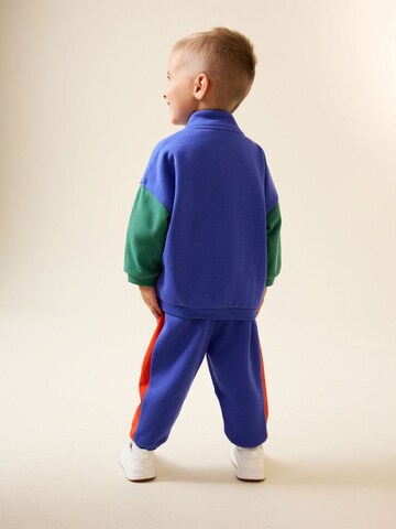 Next - Ropa para correr en azul