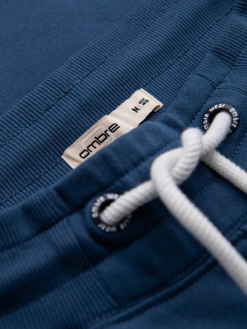 Effilé Pantalon de sport Ombre en bleu