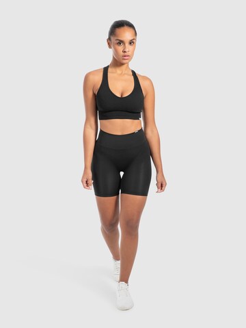 Skinny Pantalon de sport Smilodox en noir