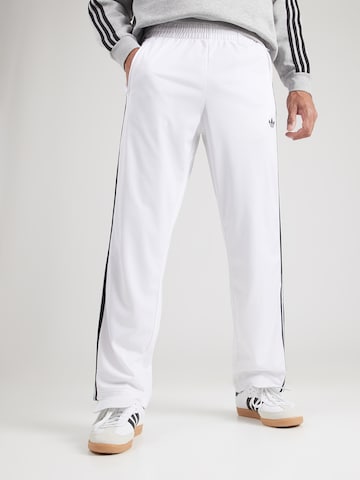ADIDAS ORIGINALS Normalny krój Spodnie 'Firebird' w kolorze biały: przód