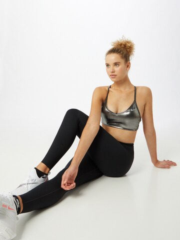 NIKE Regular Sports Bra 'Indy' in Silver