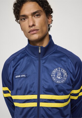 Giacca per l'allenamento 'Dmwu' di Unfair Athletics in blu