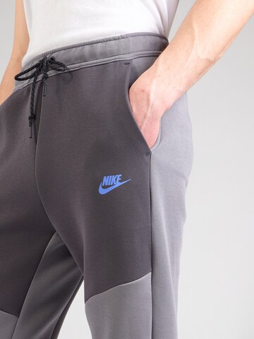 Nike Sportswear Конический (Tapered) Штаны 'TCH FLC' в Серый