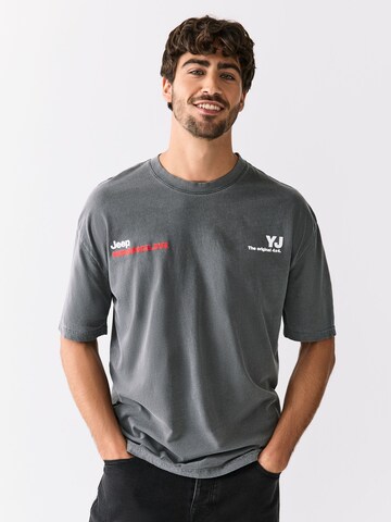 T-Shirt Next en gris