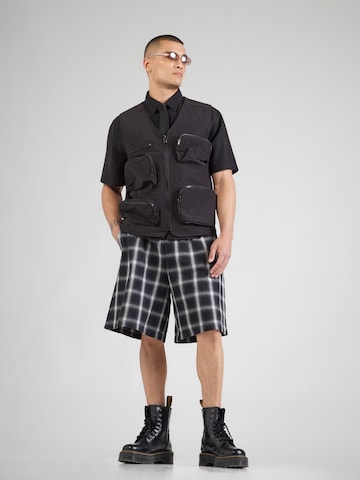 WEEKDAY Loosefit Housut 'Fargo' värissä musta
