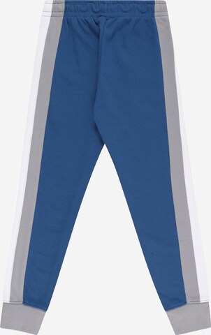 Jordan Tapered Trousers in Blue