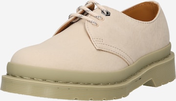 Dr. Martens - Zapatos con cordón en beige: frente