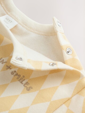 Next Strampler in Gelb