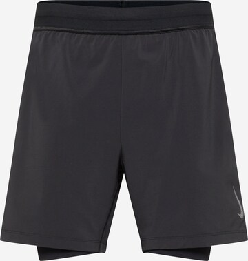 Regular Pantalon de sport NIKE en noir : devant