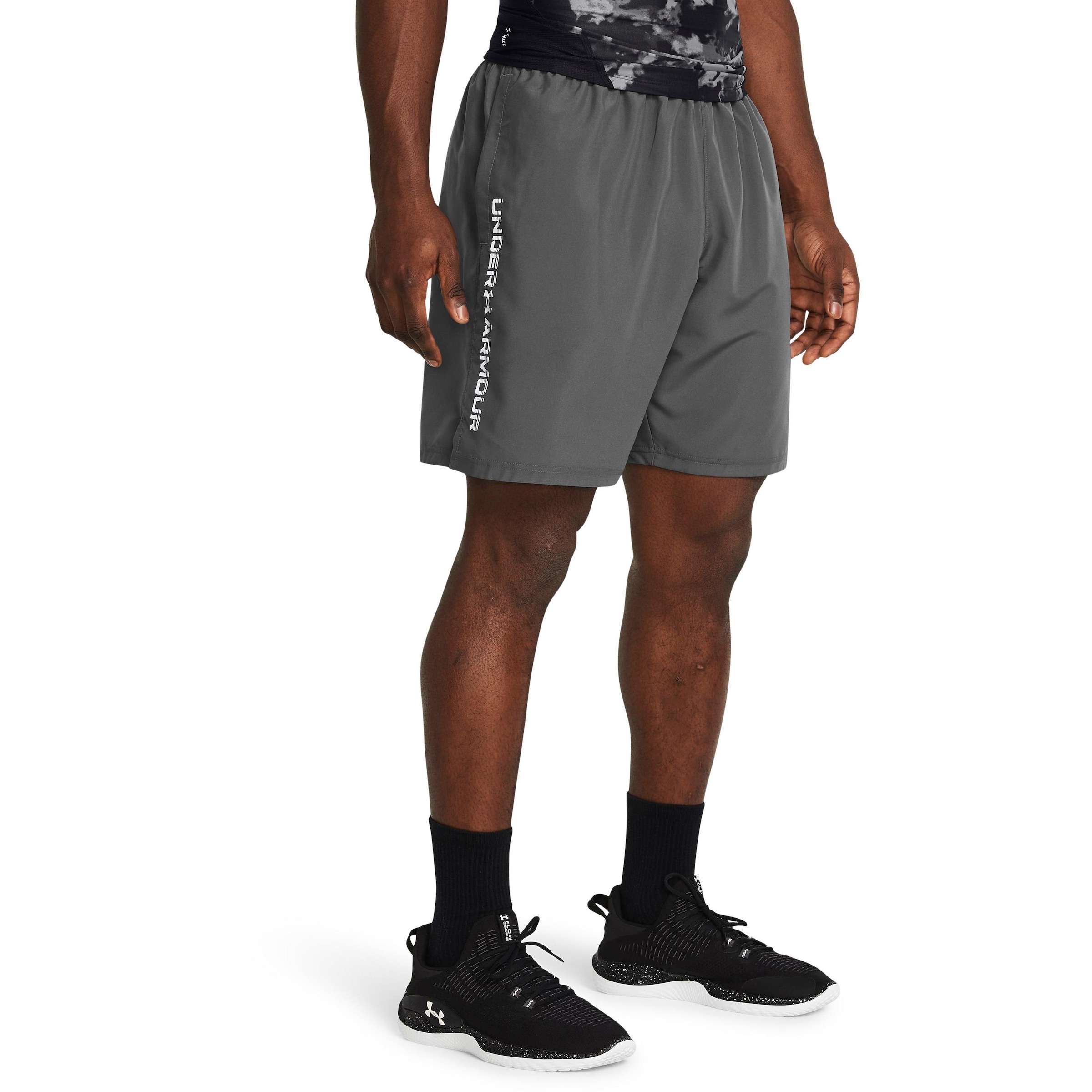 UNDER ARMOUR - regular Pantalón deportivo 'Wordmark' en gris: frente