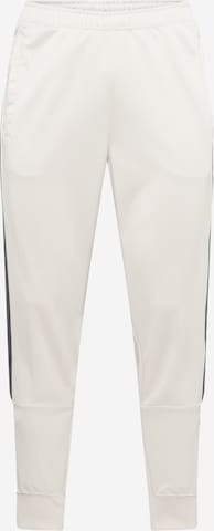 Regular Pantalon fonctionnel 'AIR' Nike Sportswear en beige : devant