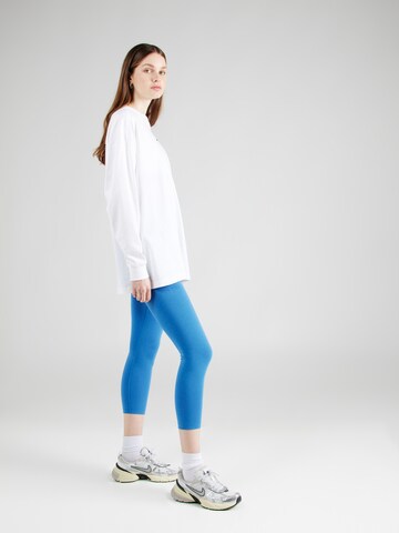 Nike Sportswear Skinny Sportbroek in Blauw