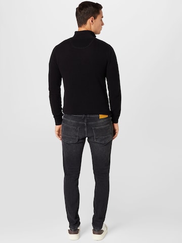 Goldgarn Slimfit Jeans i svart