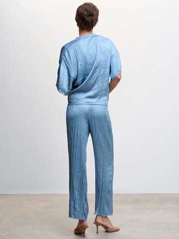 MANGO Lużny krój Spodnie w kolorze niebieski