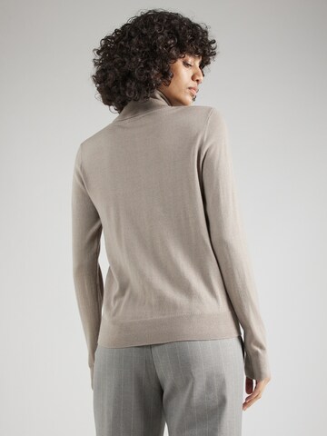 Pull-over Sisley en beige