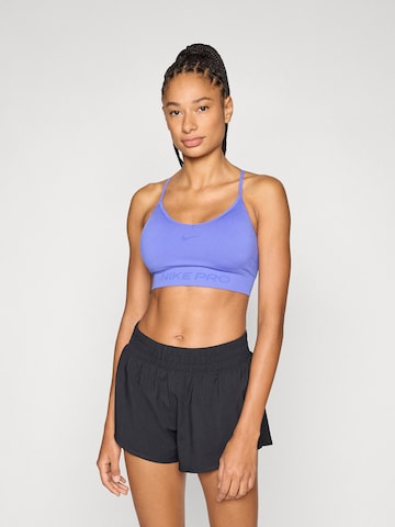 NIKE Бюстие Спортен сутиен в синьо: отпред