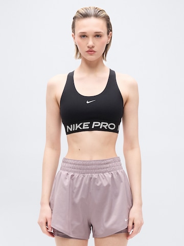 Bustino Reggiseno sportivo 'PRO' di NIKE in nero: frontale