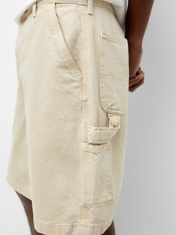 Pull&Bear Normalny krój Jeansy w kolorze beżowy