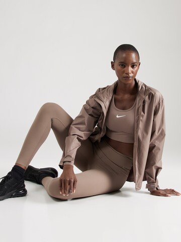 NIKE Спортивная куртка 'FAST' в Коричневый