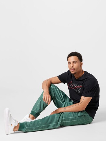 Nike Sportswear Дънки Tapered Leg Панталон в зелено