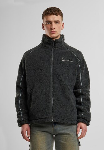 Karl Kani Between-season jacket in Black: front
