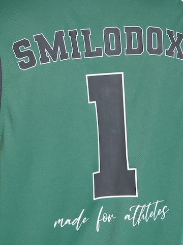 Smilodox Performance Shirt 'Triple Thrive' in Green