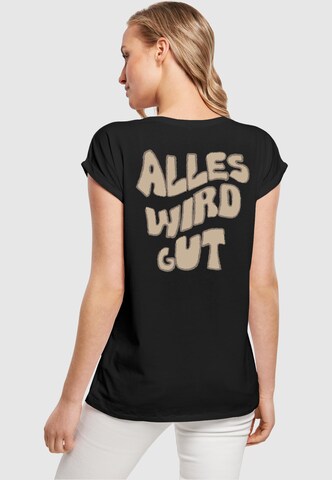 Merchcode T-Shirt 'Alles Wird Gut' in Schwarz: Vorderseite