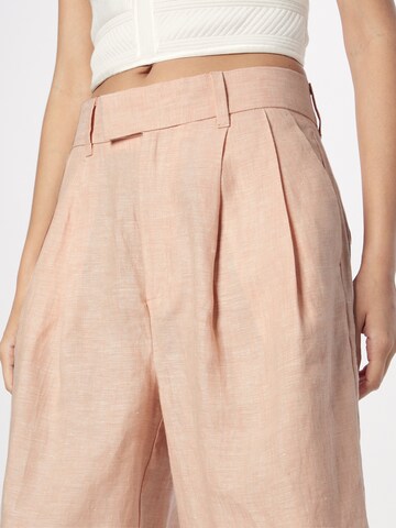 Wide leg Pantaloni con pieghe di Banana Republic in arancione