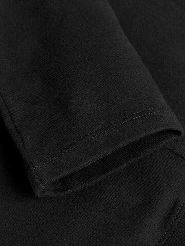 Skinny Leggings di Next in nero