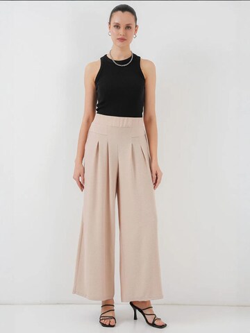 Pantaloni con pieghe di Bigdart in beige