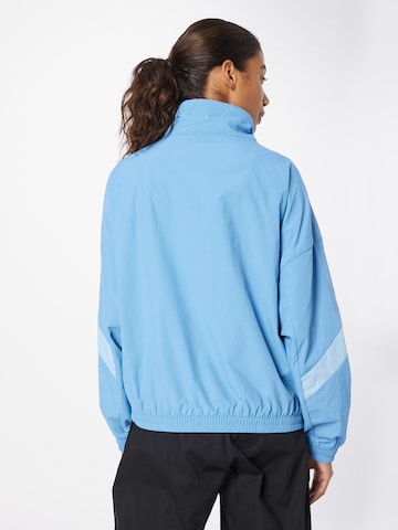 new balancePrijelazna jakna 'Athletics' - plava boja